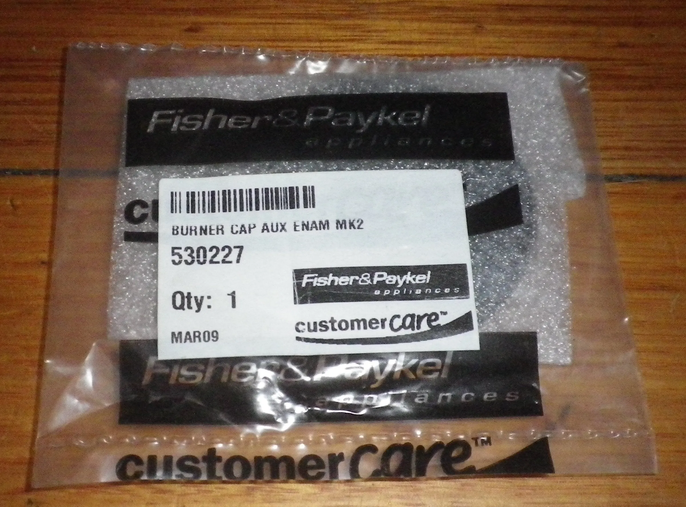 Fisher & Paykel Gas Cooktop Gloss Black Aux 55mm Burner Cap - Part No. FP530227